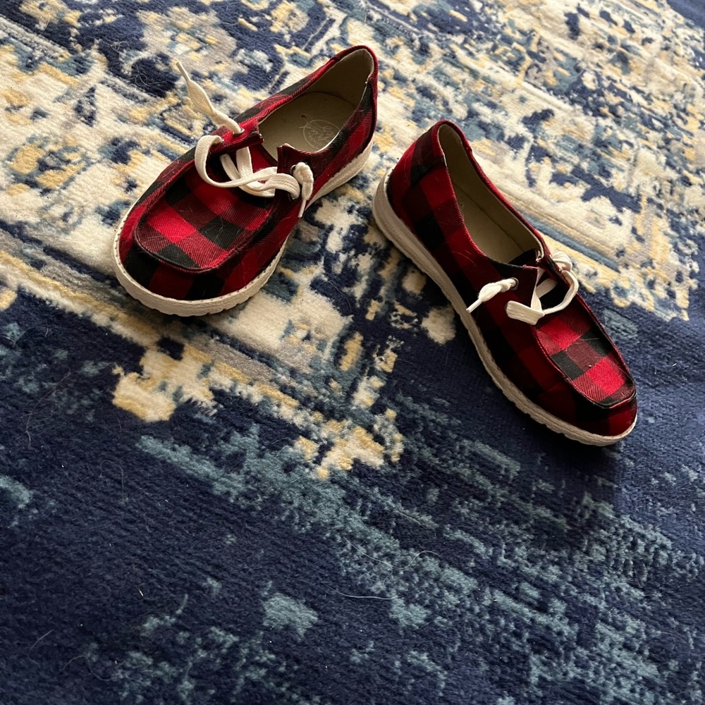 I am selling plaid slip on shoes, size 6, never worn